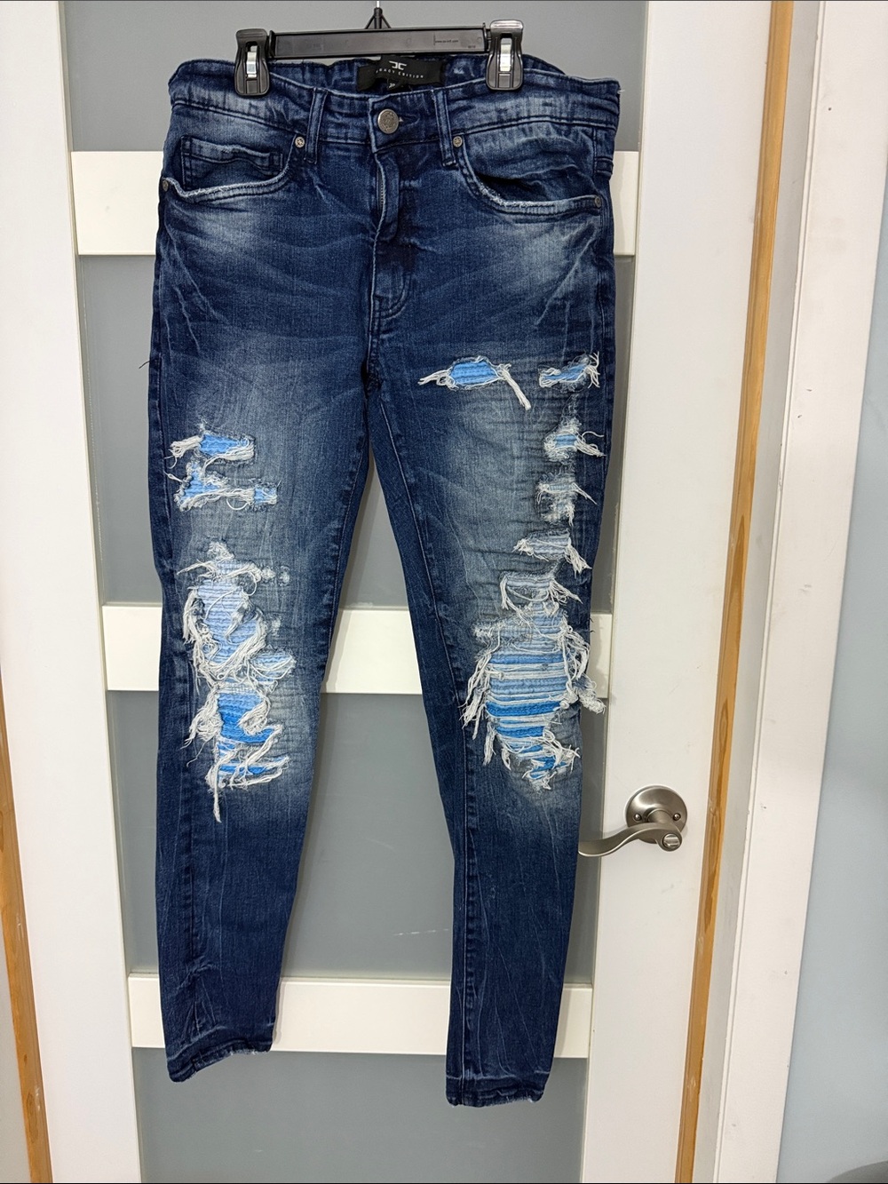 Jordan Dark Indigo Ripped Skinny Jeans with Light Blue Patch Details